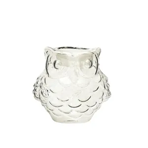 Transparent glass owl candle holder for elegant home decor and candlelight dinners