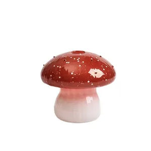 Artistic red mushroom glass vase with white spots for creative hydroponic home decor