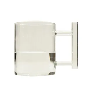 Elegant minimalist clear glass coffee mug with unique geometric square handle design