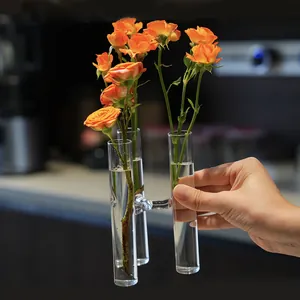 Modern creative connected glass test tube vase for elegant hydroponic home decoration.
