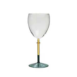 Elegant color-blocked glass wine goblet with transparent bowl and amber-green stem