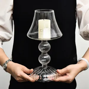 Elegant lamp-shaped glass candle holder for romantic dining table decor and weddings
