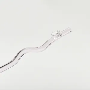 Elegant pink wavy reusable glass straw featuring a delicate clear butterfly ornament for coffee