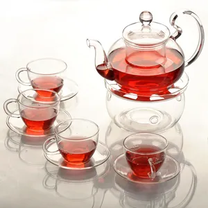 Heat-resistant borosilicate glass teapot set with 4 cups and a candle warmer base