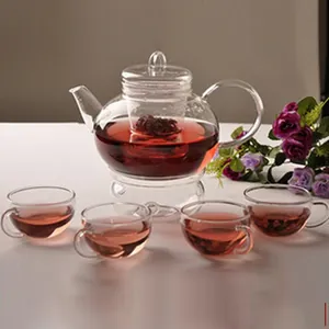 Clear heat-resistant borosilicate glass teapot set with infuser and four matching cups