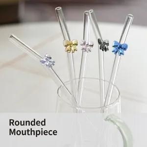 Set of colorful glass straws featuring decorative bow-knots in various vibrant colors