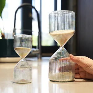 Elegant iridescent ribbed glass hourglass timer set for modern home desk office decor.