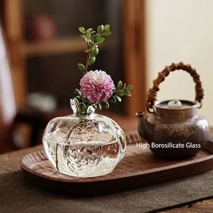 Elegant pomegranate-shaped clear glass vase for mini flower arrangements and Zen decor