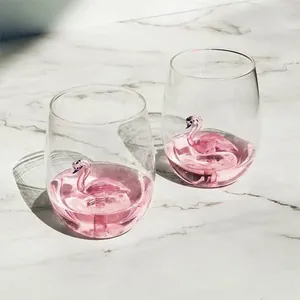 Creative glass cup featuring a detailed 3D pink flamingo figurine inside for home use