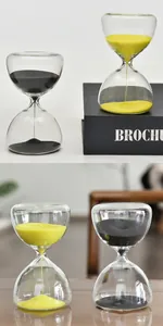Elegant detailed view of 5-minute glass hourglass timers with black and yellow sand