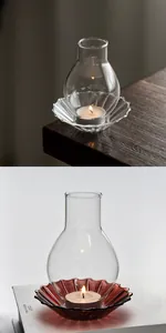 Close-up of retro windproof glass candle holder set with decorative petal base plate