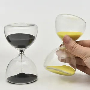 5-minute round glass hourglass timer featuring black and yellow decorative sand