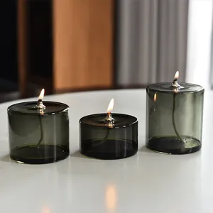 Set aus drei rauchgrünen zylindrischen Glasöllampen für eine elegante Heimdekoration