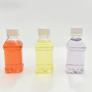 Trois bouteilles d'huile de lampe colorée sans fumée pour lampes à huile en verre