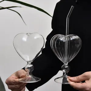 Unique heart-shaped glass cocktail goblets in smooth and ribbed fluted designs