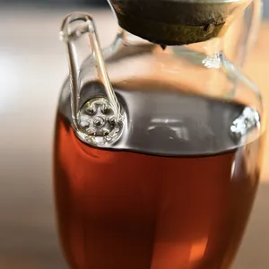 Teiera in vetro resistente al calore stile Song con filtro integrato per tè fuso