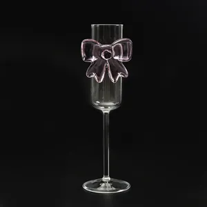 Creative high borosilicate champagne glass with pink bowknot on black background