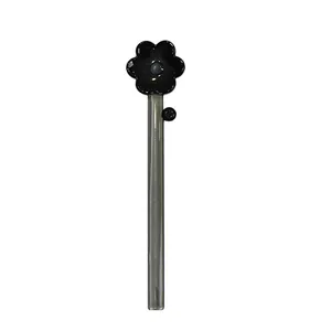 Minimalist transparent glass coffee stirrer featuring a unique black flower decoration