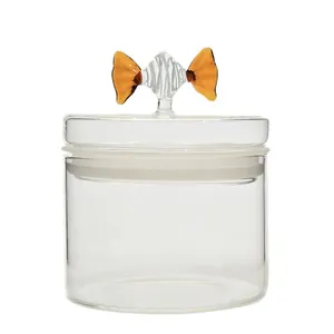 Tarro de cristal transparente con tapa de asa en forma de caramelo para cocina.