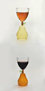 Unique pear-shaped creative glass goblet for wine and cocktails with leaf detail.