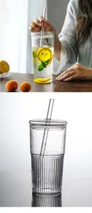 Large glass straw cup with lid and textured ribbed hammered design for coffee and tea