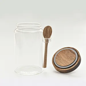 Japanese style glass storage jar with wooden lid and spoon for kitchen organization