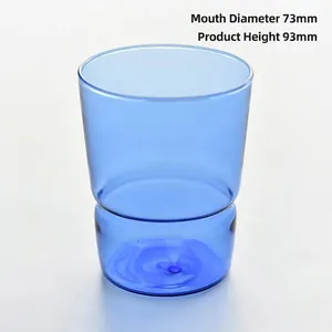 Transparent blue glass cup with stackable base design showing dimensions