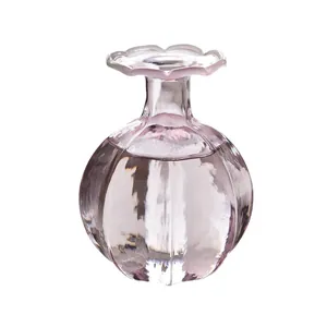 Minimalist pink glass flower vase with ruffled rim for hydroponic desktop decoration