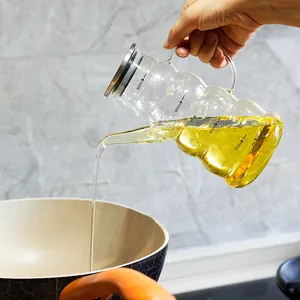Heat-resistant glass oil dispenser with handle and 800ml measurement marks