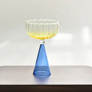 Creative yellow and blue gradient glass dessert cup with a sleek conical base design