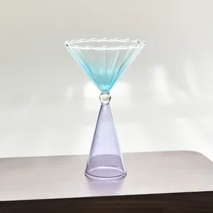 Elegant gradient dessert glass cup with fluted blue top and purple base for cocktail