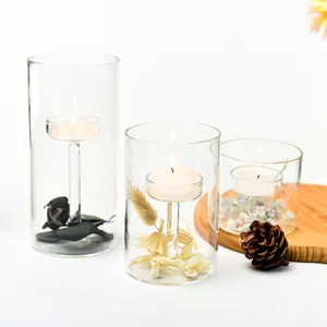 Elegantes portavelas de vidrio transparente estilo INS para decoración del hogar.