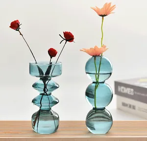 Modern blue bubble glass vases for creative floral arrangements and home decor