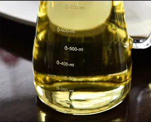 Macro view of clear glass oil dispenser bottle with 100ml to 700ml capacity markings