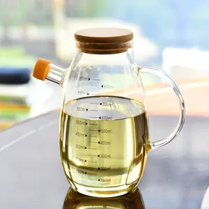 Distributeur d'huile en verre avec couvercle bambou et graduation de mesure