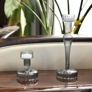 Elegant smoke gray striped glass candlestick set for sophisticated table decoration.