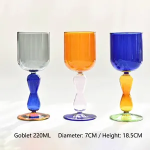 Set of three creative colorblock glass wine goblets for colorful cocktail and champagne parties