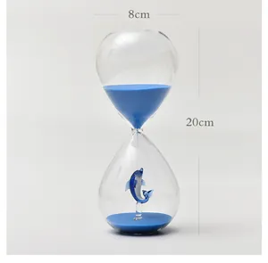 Creative 20cm glass hourglass timer decorated with blue sand and dolphin ornament