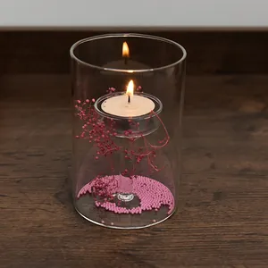 Elegante Europese cilindrische glazen kandelaar met roze bloemendecoratie voor huis