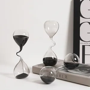Clessidra artistica minimalista in vetro con collo curvo e sabbia nera per decorazione