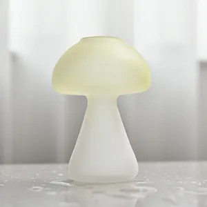 Elegant mushroom-shaped frosted glass vase for minimalist home decor and aroma therapy.