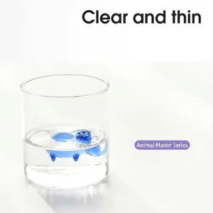 Creative 3D animal glass water cup featuring a blue cartoon elephant figurine inside