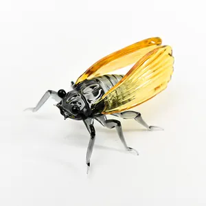 Elegant handcrafted amber and black glass cicada figurine for creative home office decor
