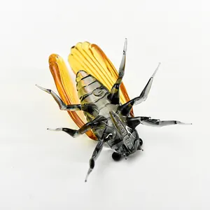 Exquisite handcrafted glass cicada figurine ornament with amber wings for home office decor