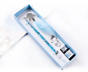 Elegant dreamcatcher glass dip pen gift set with azure ink and feather in a blue box