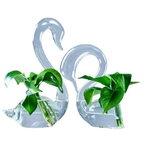 Elegant pair of swan-shaped glass vases for creative home decor and wedding gifts