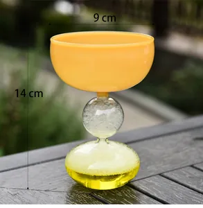 Detail view of yellow bubble glass dessert cup showing 14cm height and 9cm diameter