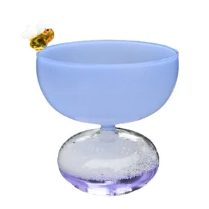 Creative blue glass ice cream dessert bowl featuring a bee ornament and bubble base design