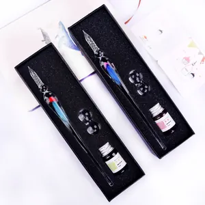 Elegant handmade jellyfish glass dip pen set with colorful ink bottles and clear pen rests