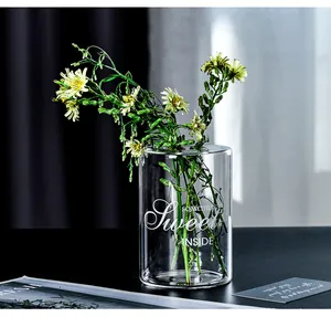 Aesthetic clear glass vase with "Sweet" letter print for home decor and flowers.